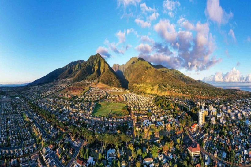 Aerial view of Wailuku town beneath the West Maui mountains