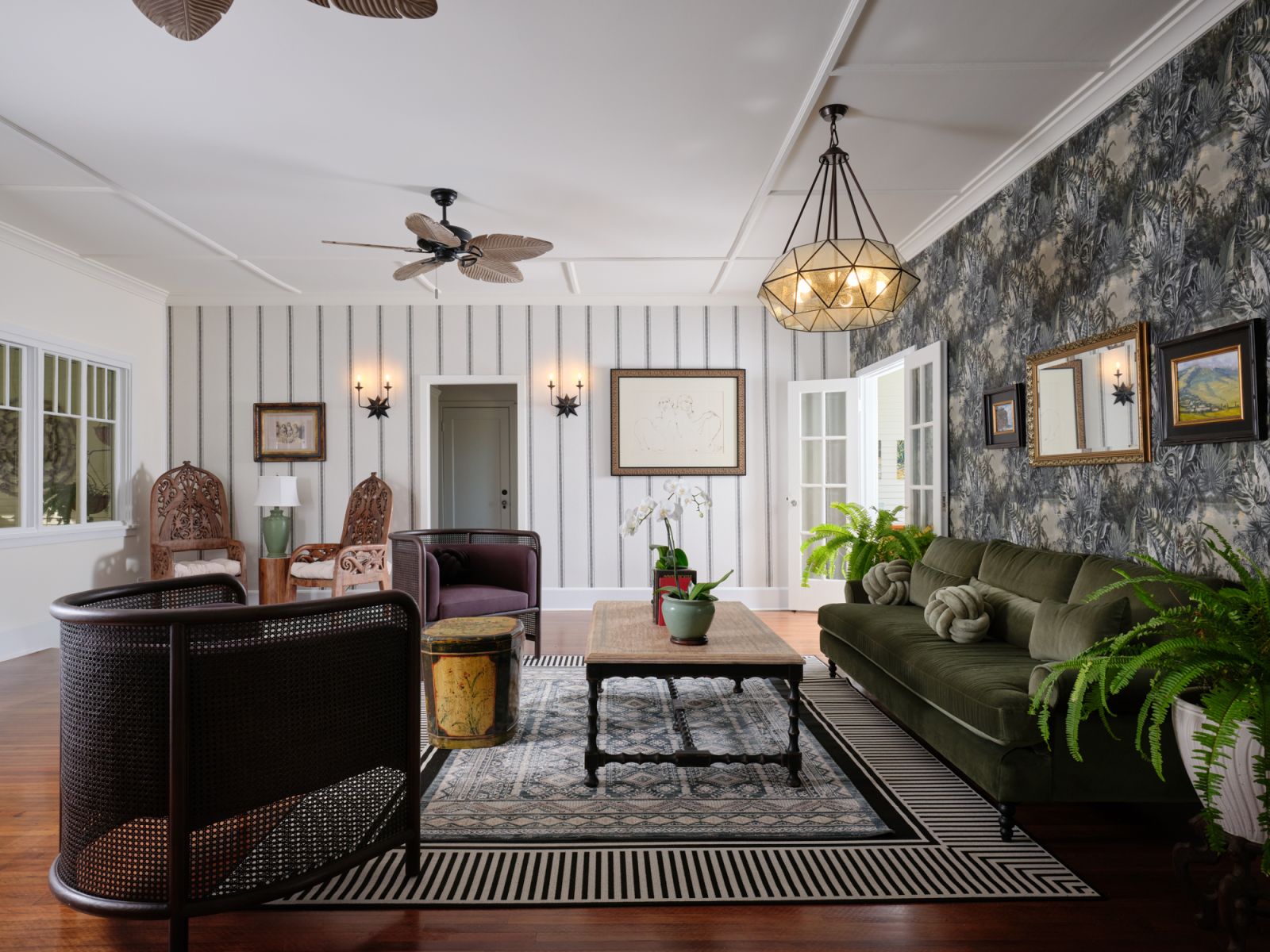Elegant cane-furniture parlor at The Historic Wailuku Inn